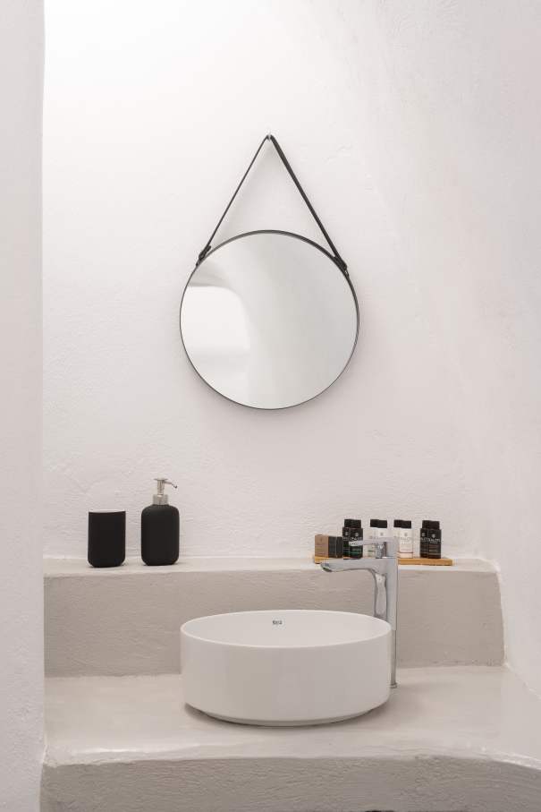 Every detail of Yposkafon Villa, from the traditional cave house concept to the luxurious bathroom fittings, is designed to delight and inspire, making the villa a destination in itself. The villa features some of Roca's elegantly simple bathroom products to perfectly complement its minimalist design. White plastered surfaces highlight Roca’s Debba Round WC and Inspira’s round basin paired with the sleek L20 faucet. The basin's smooth, rounded contours of the basin and toilet and the faucet's contemporary chrome finish create a harmonious, visually pleasing environment that promote calm and relaxation.4